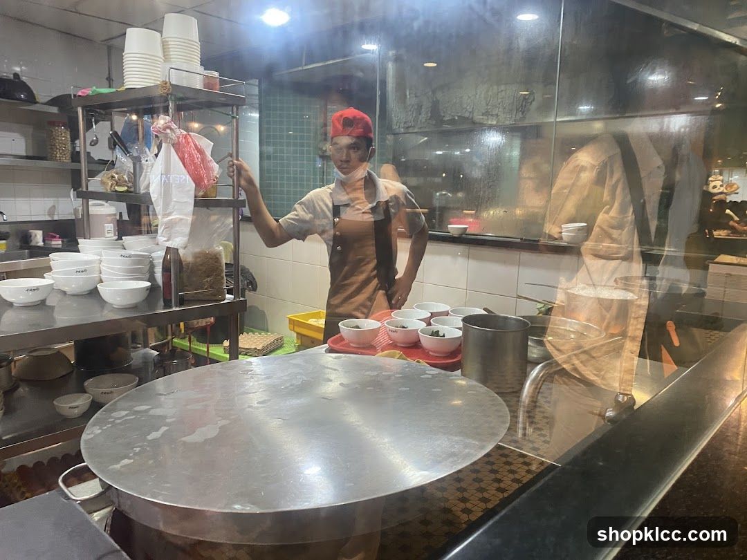Kitchen Staff Preparing Food