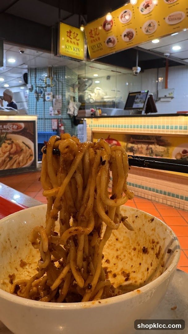 Noodles being lifted from a bowl