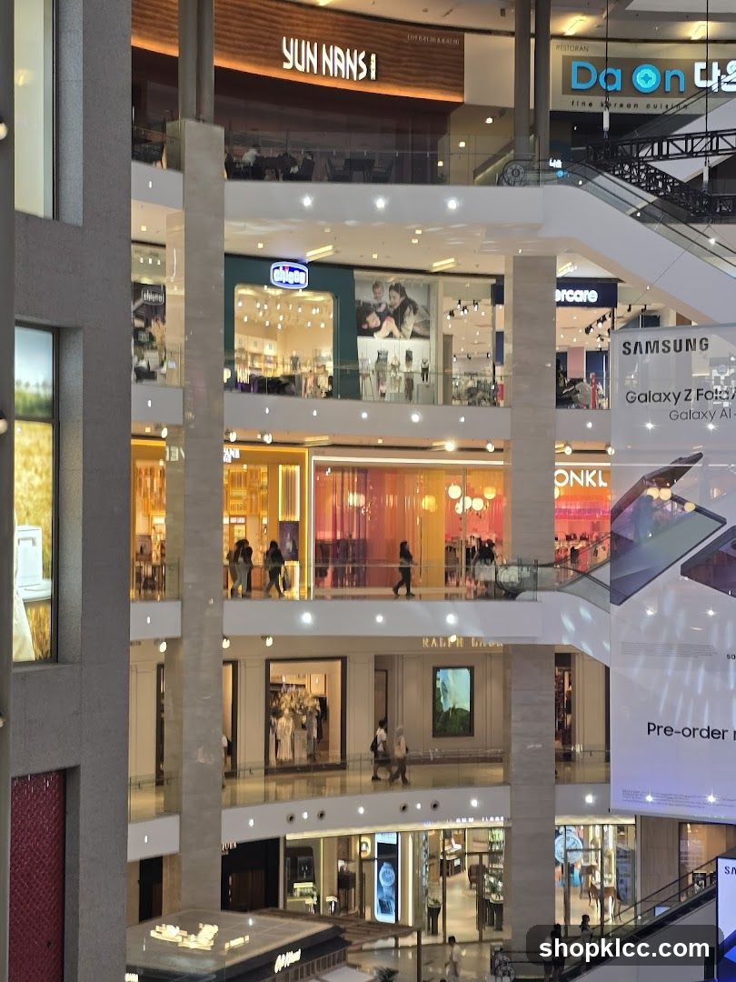 Mall Interior with Various Shops and Advertisements