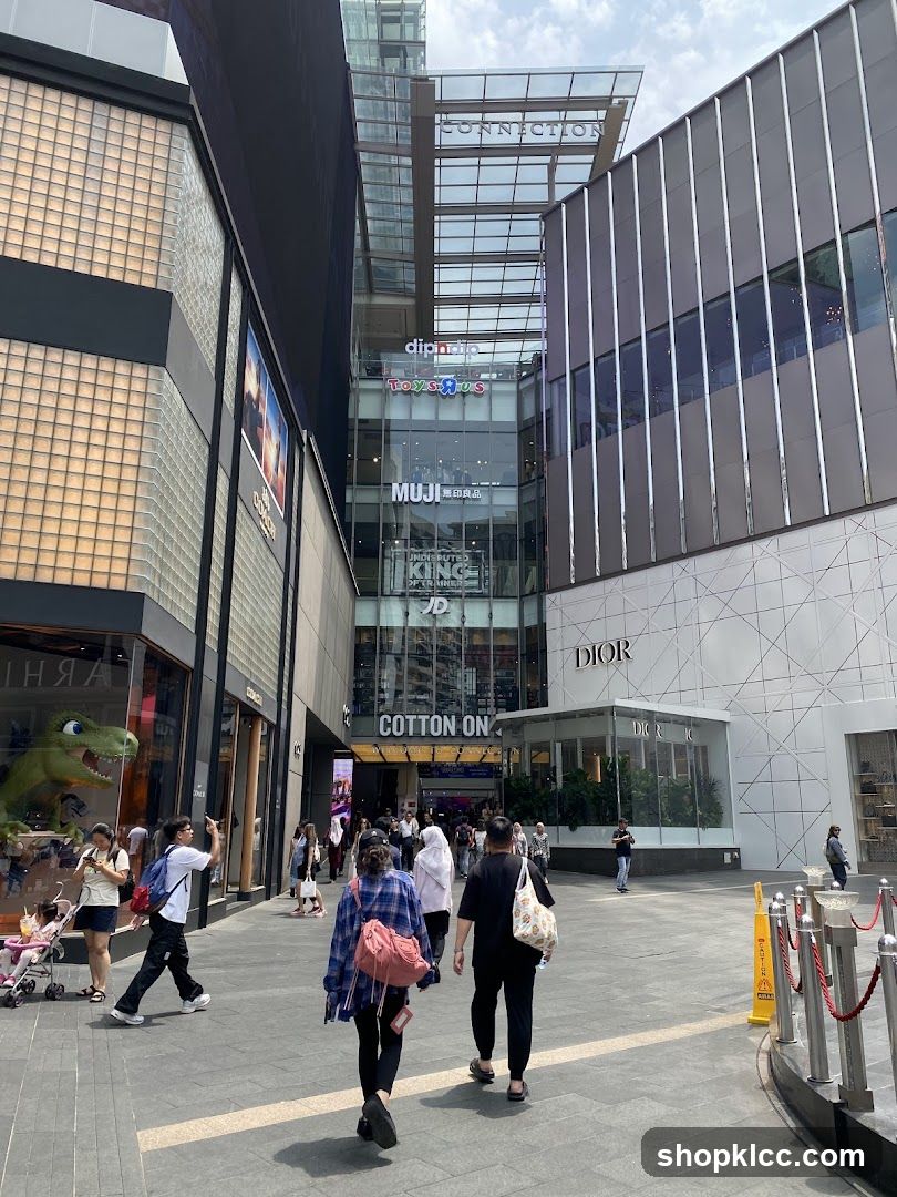 Outdoor shopping area with various stores