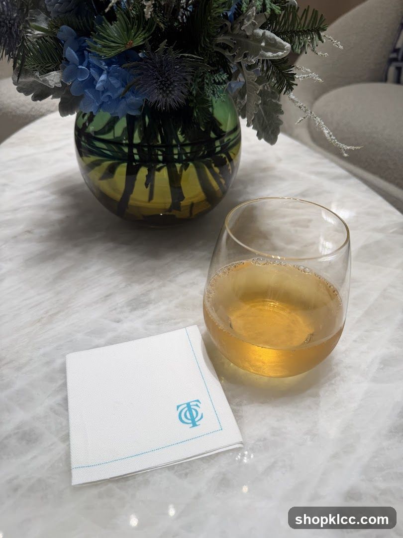 Drink and Flowers on Marble Table