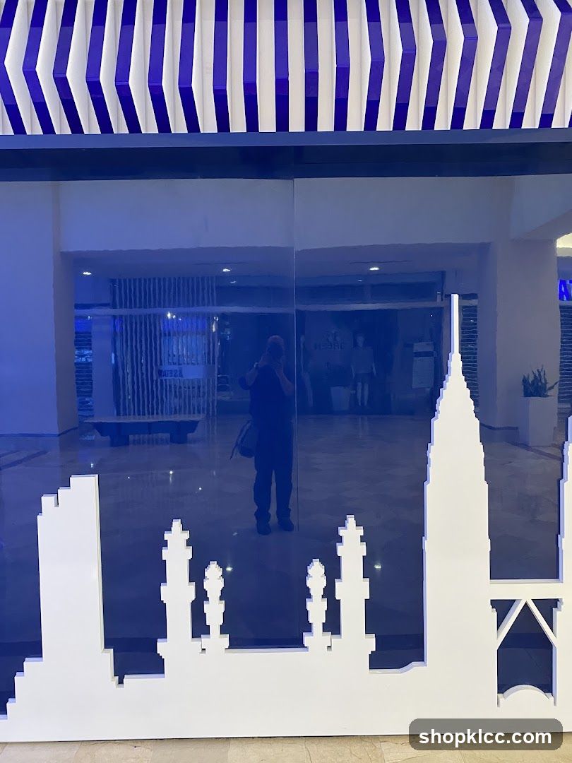 Reflective Storefront with Skyline Silhouette
