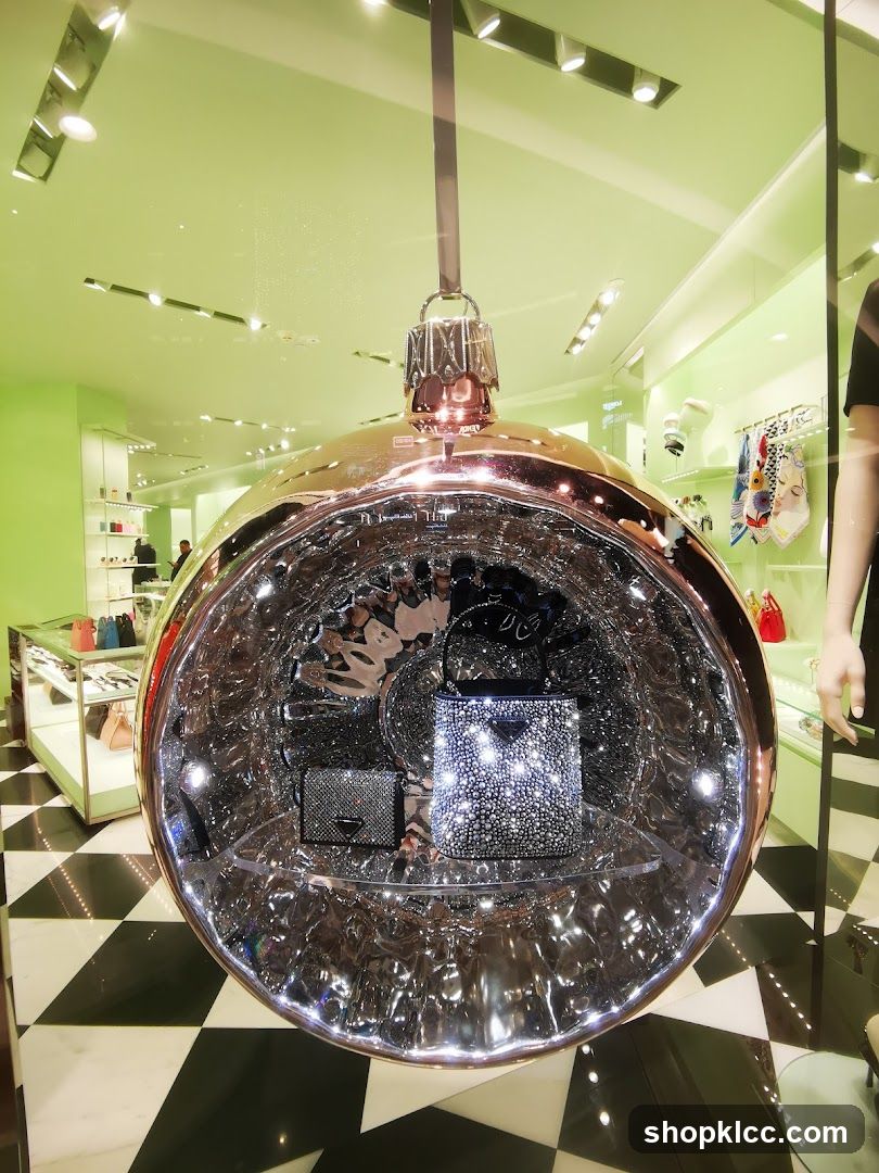 Store Window Display with Large Ornament and Handbags