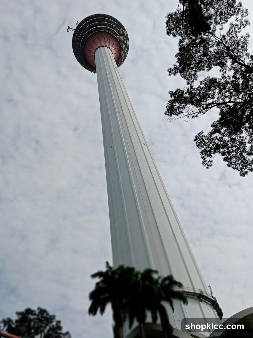 Tall Tower Against Cloudy Sky