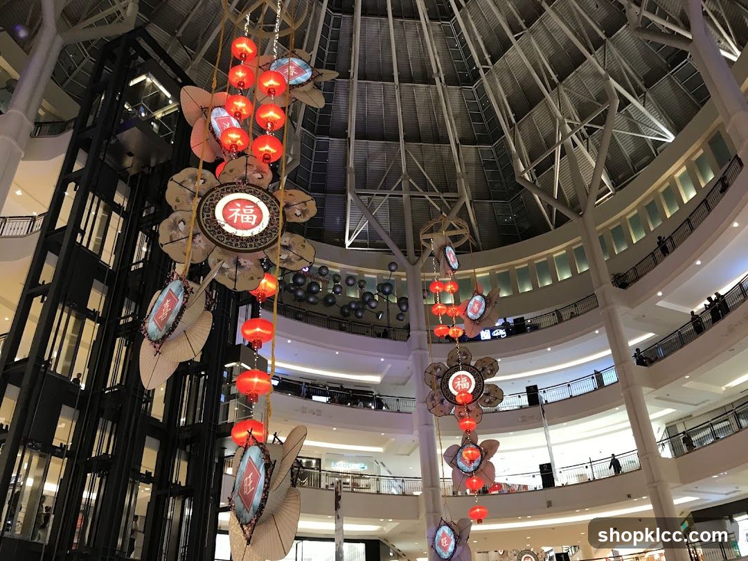 Interior of a multi-level shopping mall with festive decorations