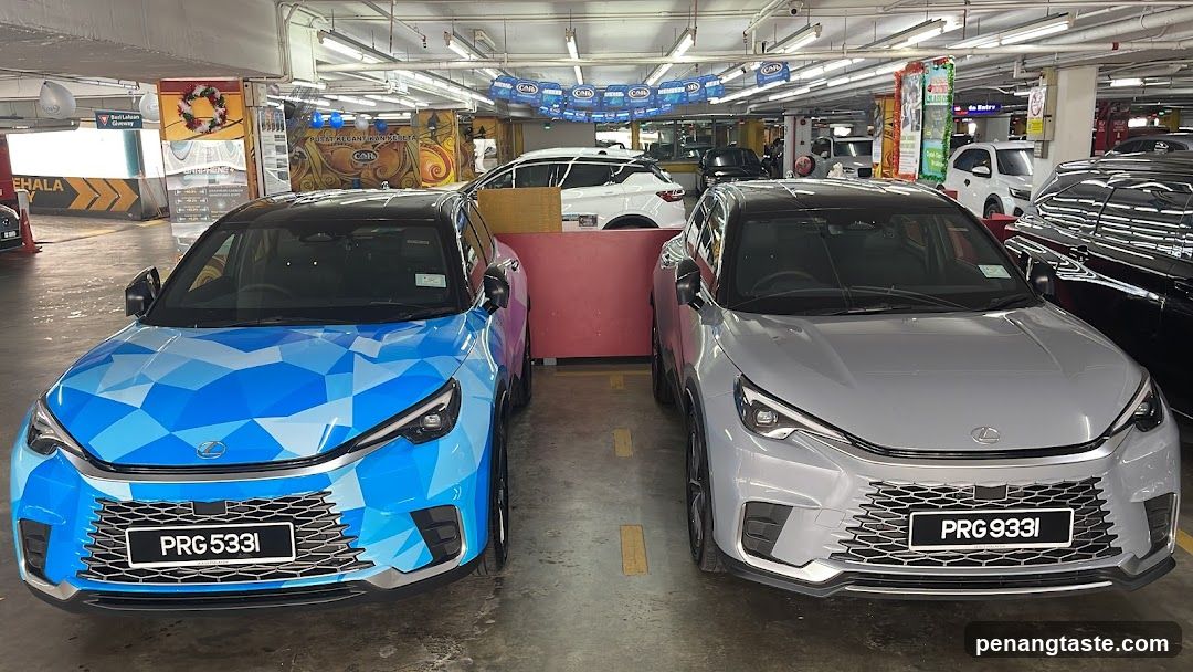 Two cars in a parking lot