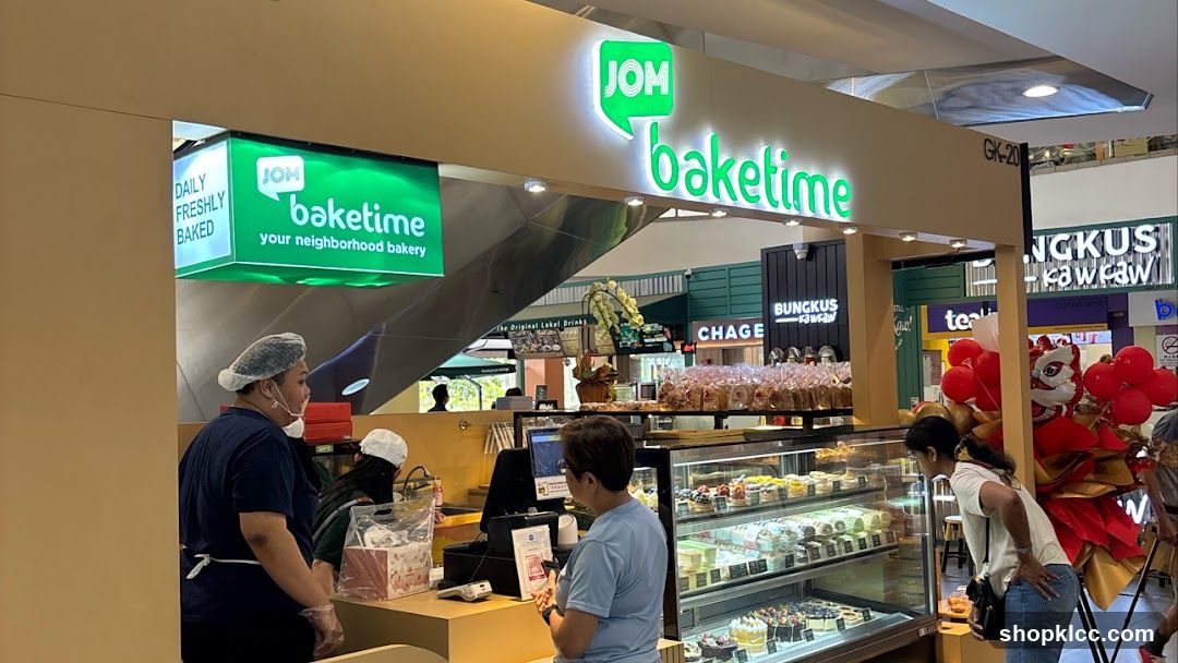 Bakery Store Interior with Staff and Customers