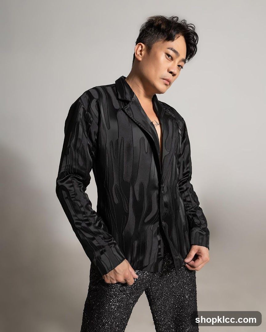 Man in Black Blazer and Sequined Pants
