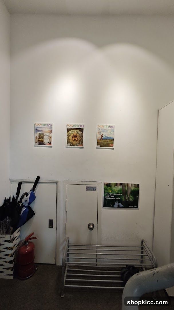 Entrance Area with Posters and Shoe Rack