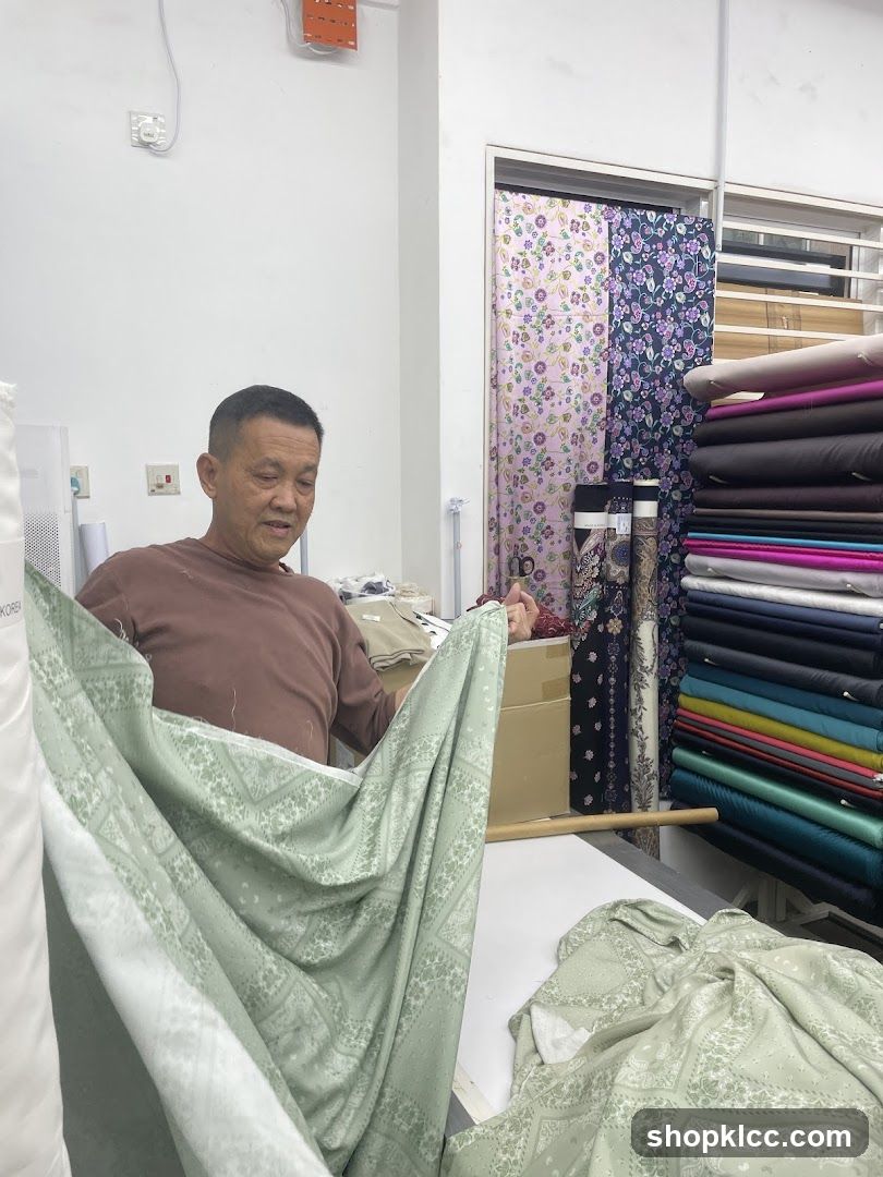 Man holding fabric in a store