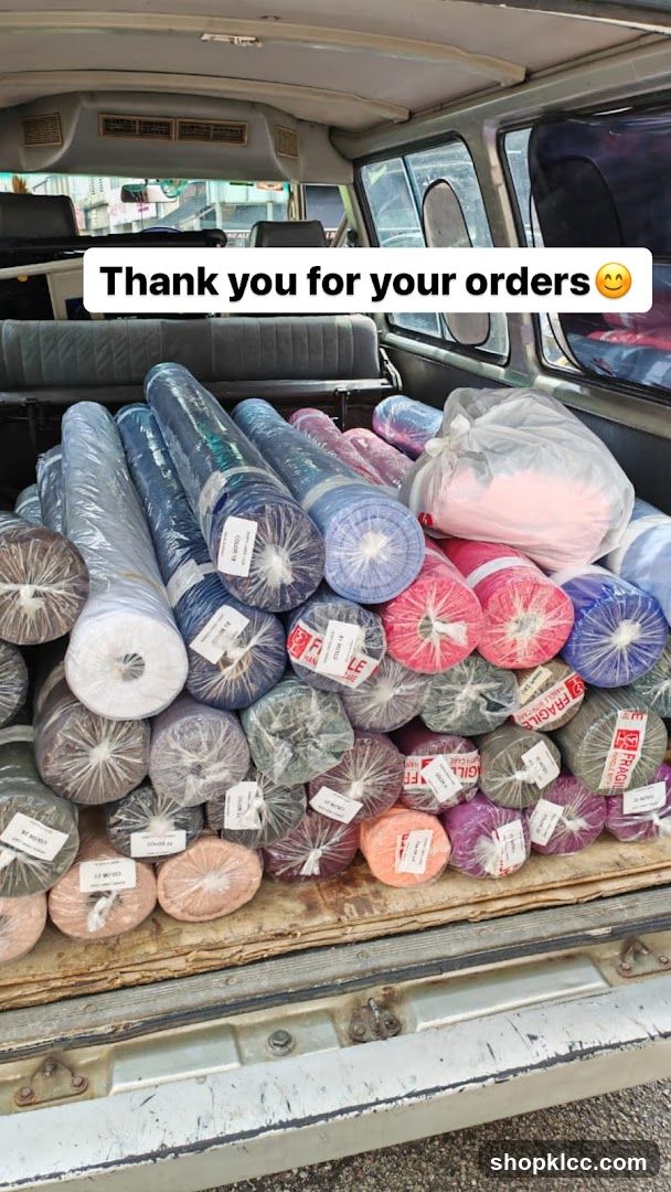 Rolls of Fabric in a Vehicle