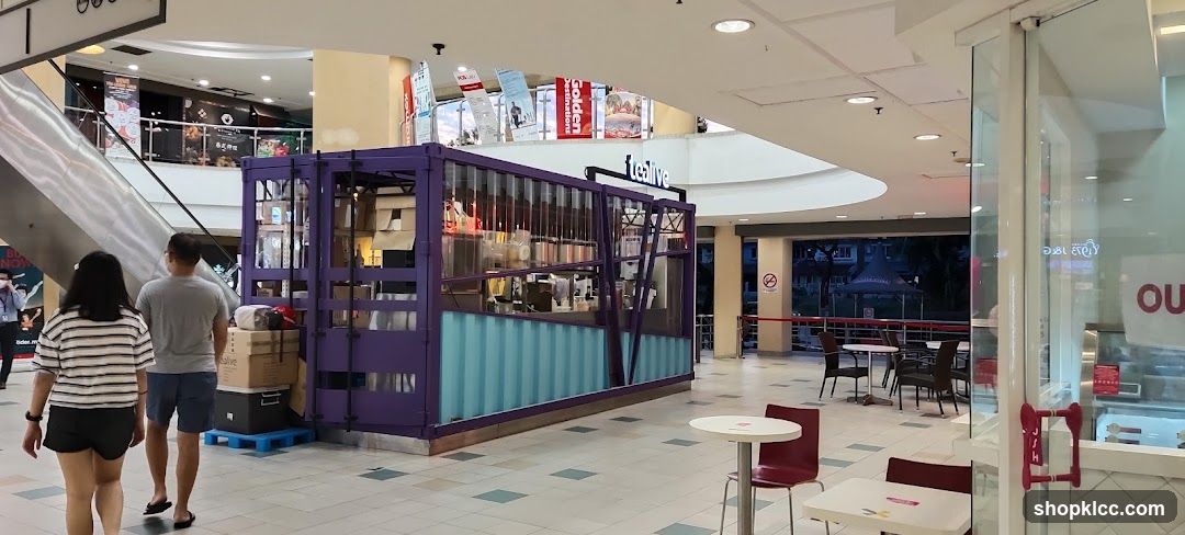 Purple kiosk with signage