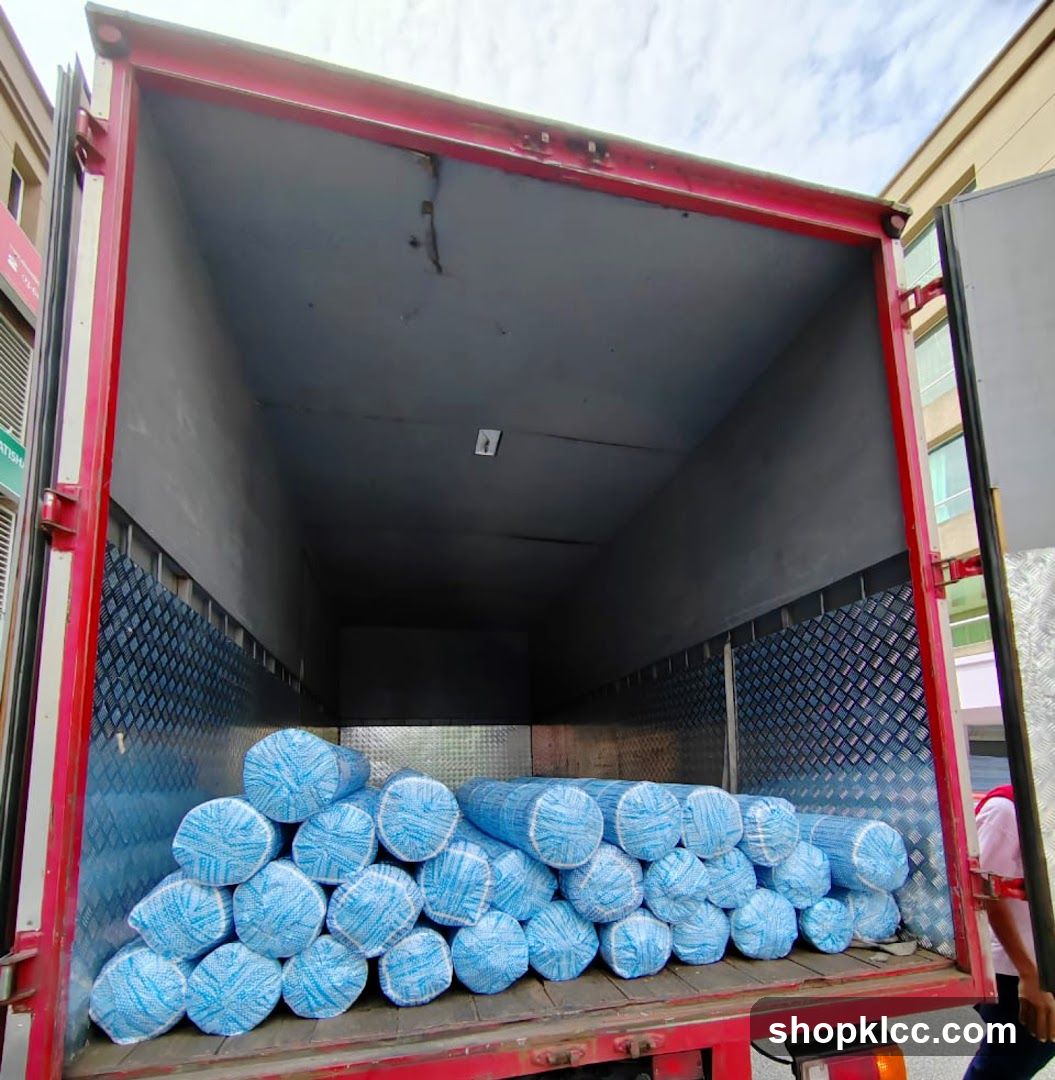 Truck Bed Loaded with Rolled Goods