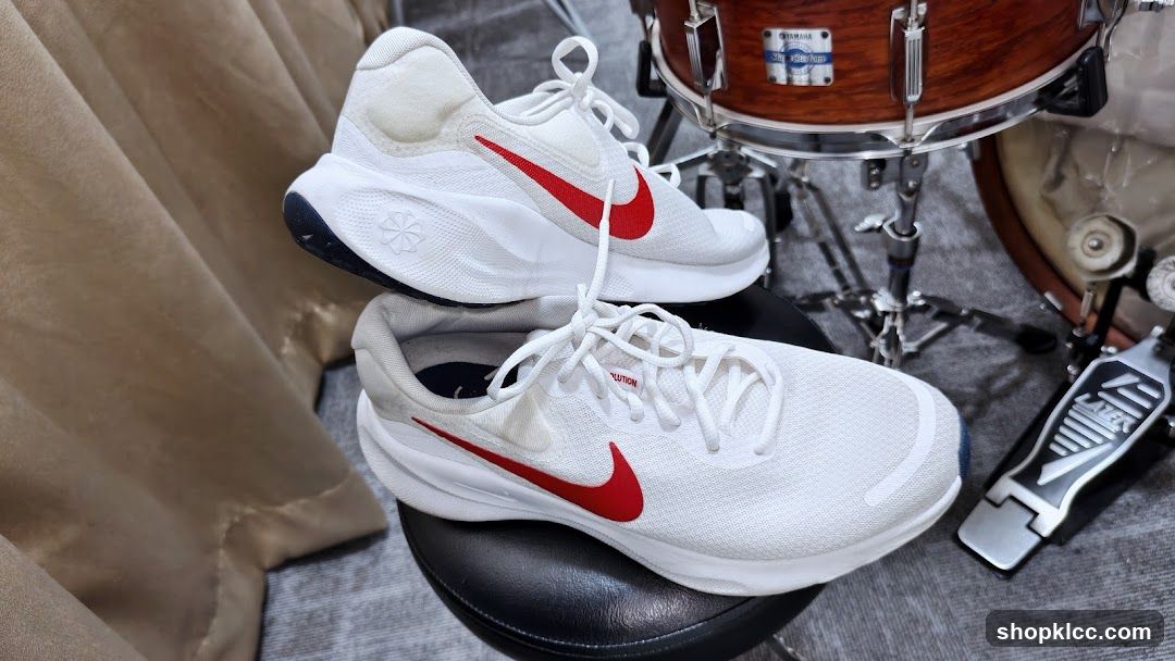 White Nike Running Shoes with Red Swoosh