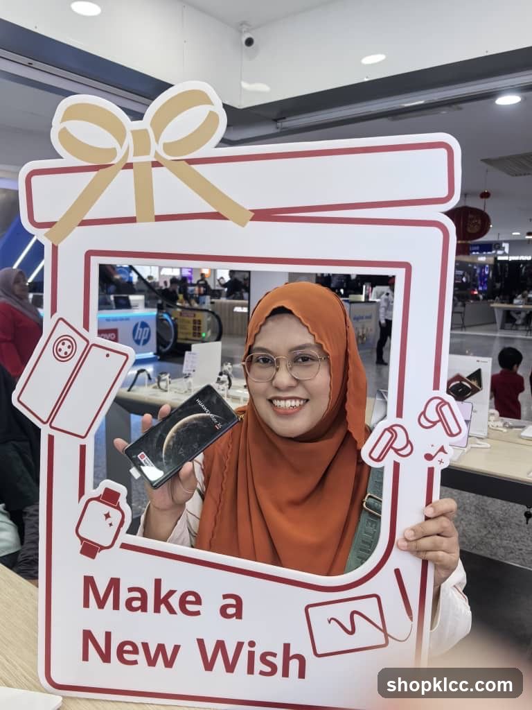 Woman Posing with a Phone and a Gift Frame