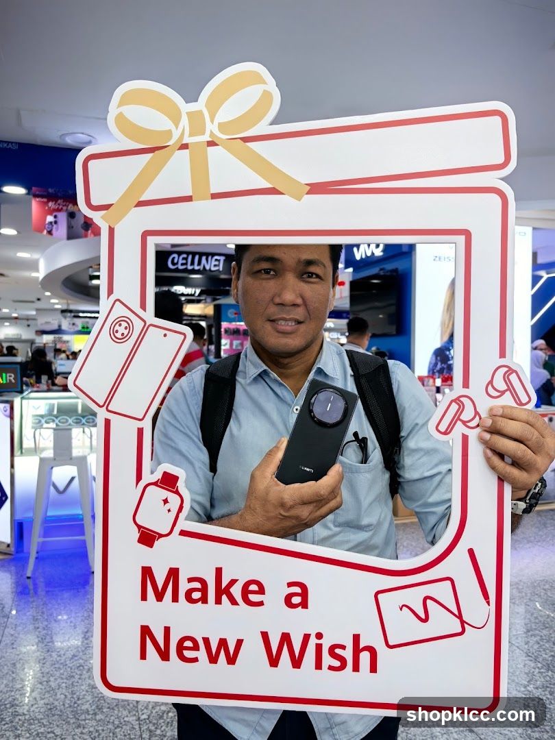 Man holding a smartphone in a promotional frame