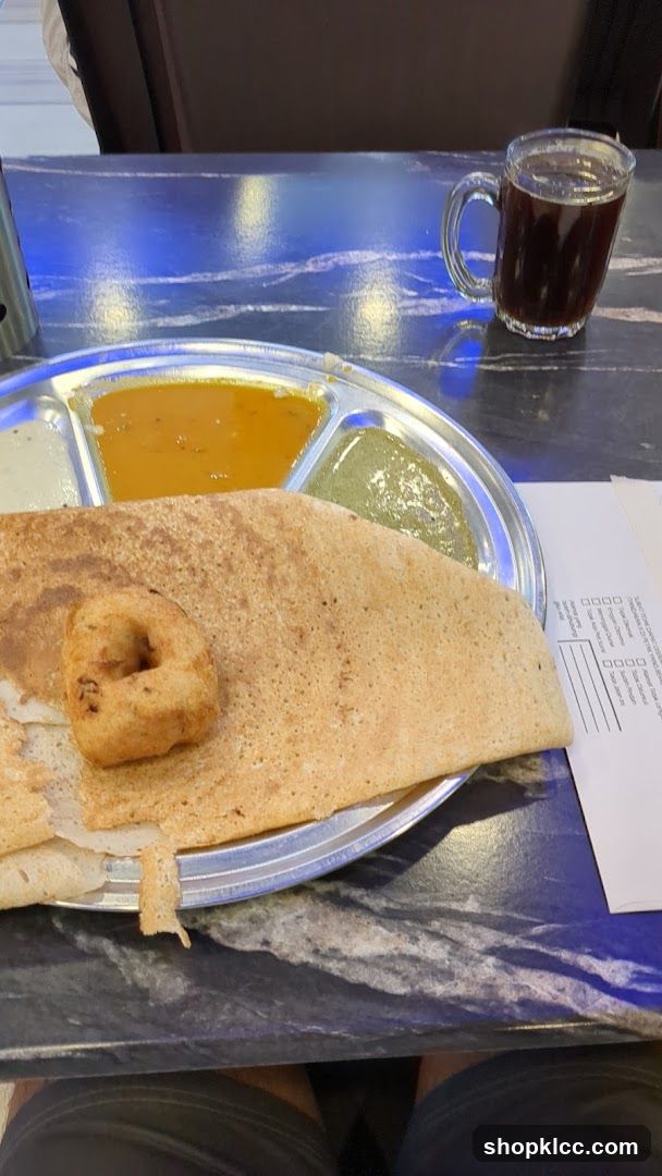 Dosa with accompaniments and tea