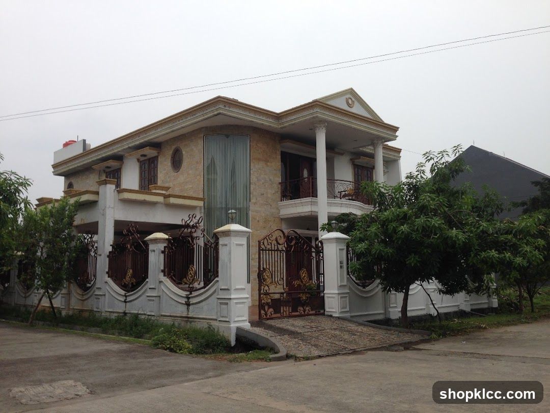 Large modern house with ornate gate
