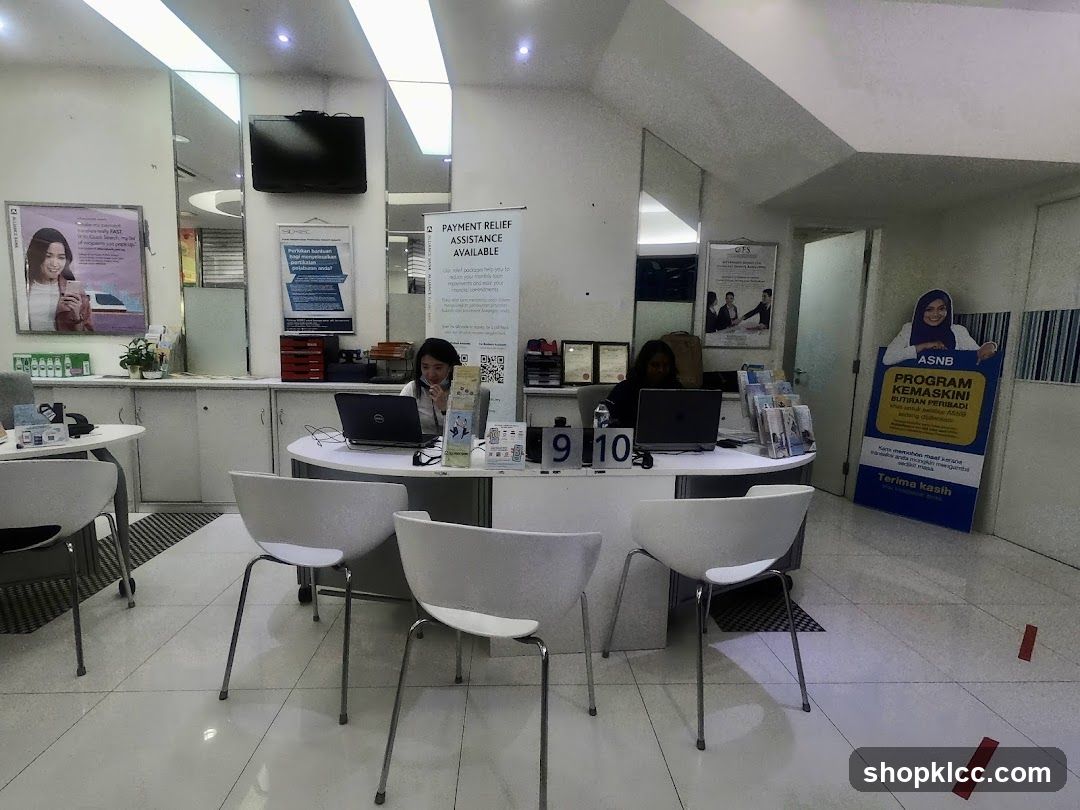 Bank interior with staff and promotional materials
