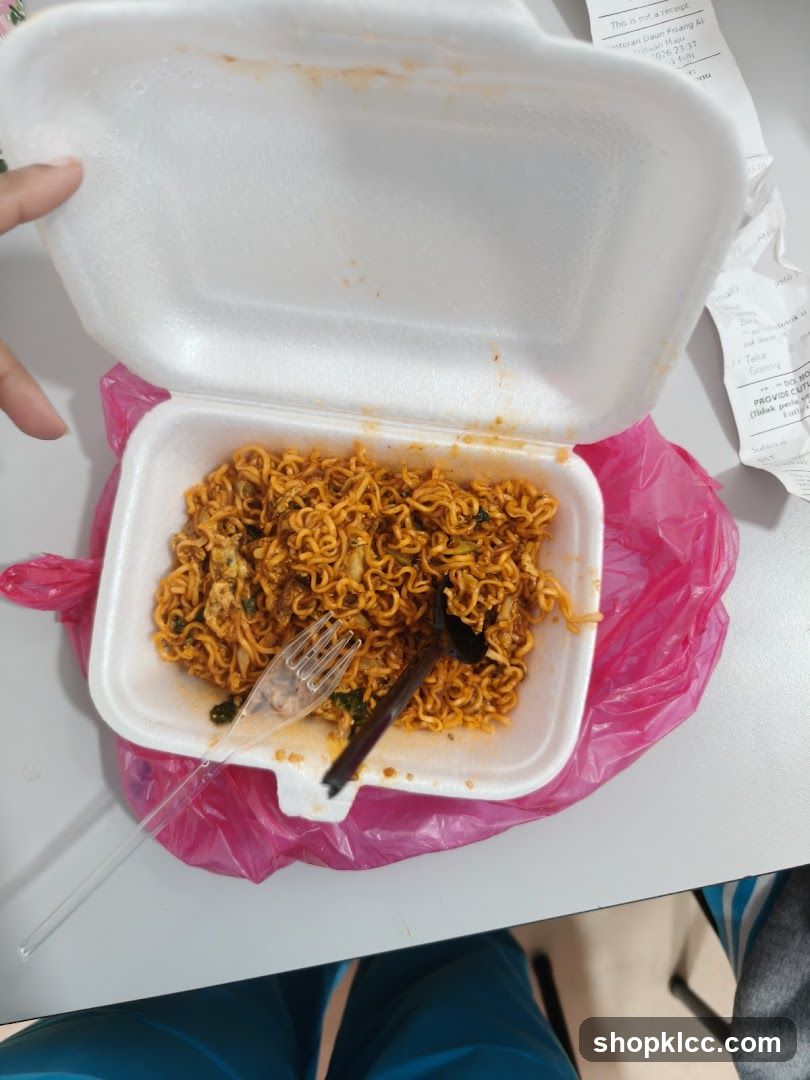 Noodles in a takeout container