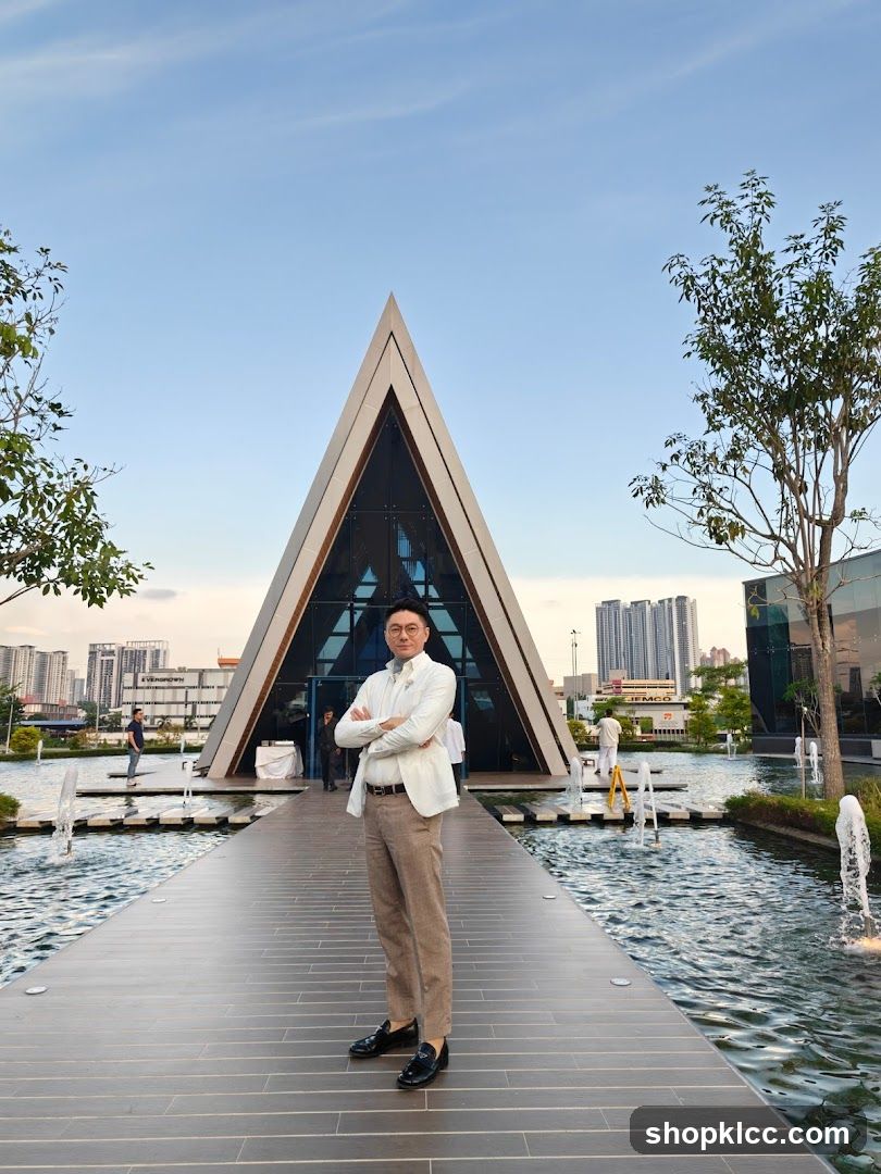 Man Posing in Front of Modern Building
