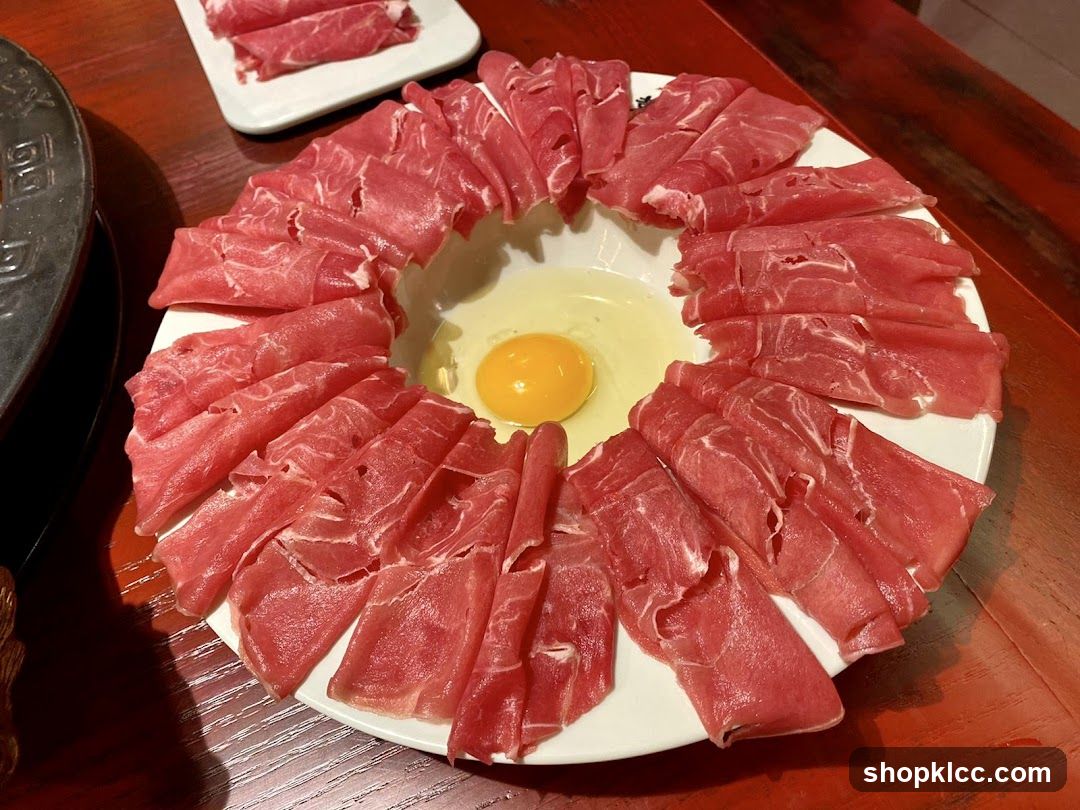 Thinly Sliced Raw Meat and Egg