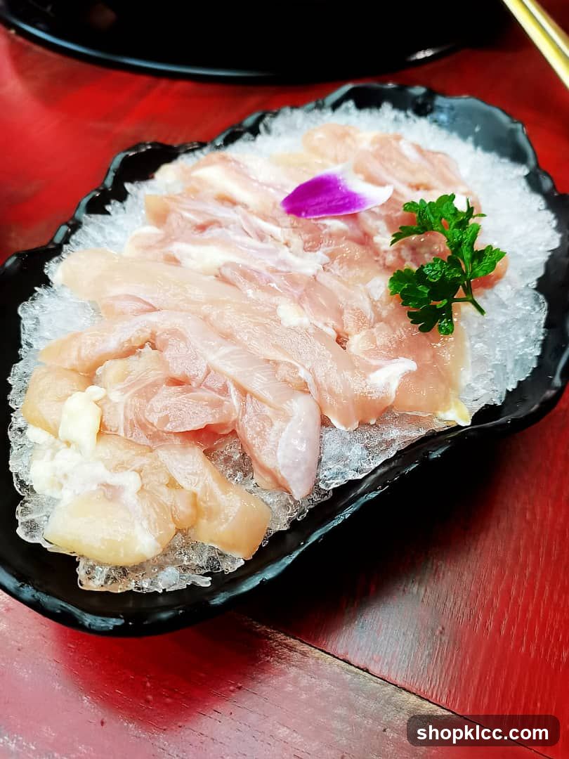 Raw Chicken Slices on Ice