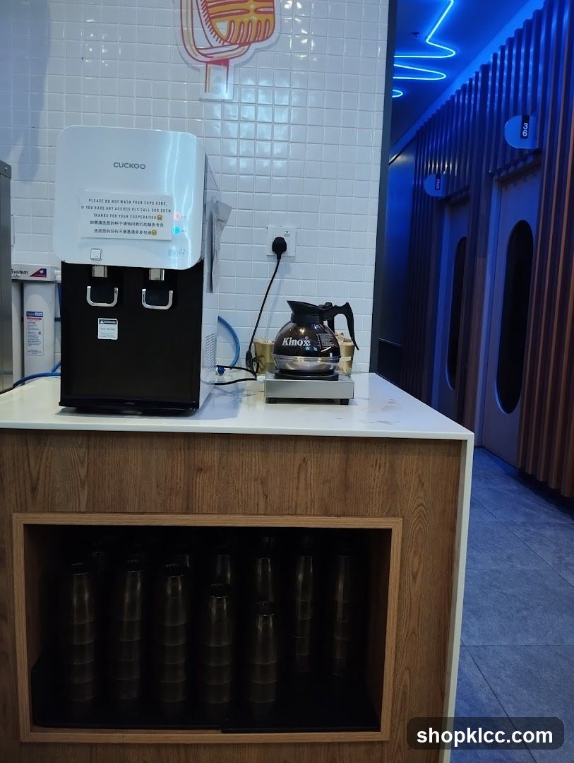 Self-service station with water dispenser and coffee pot