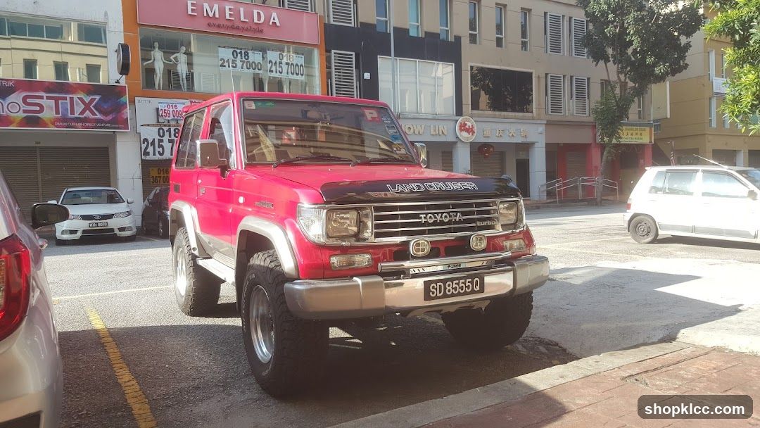 Red Toyota Land Cruiser