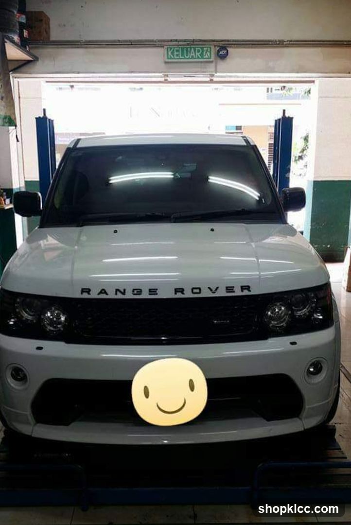 White Range Rover in a garage