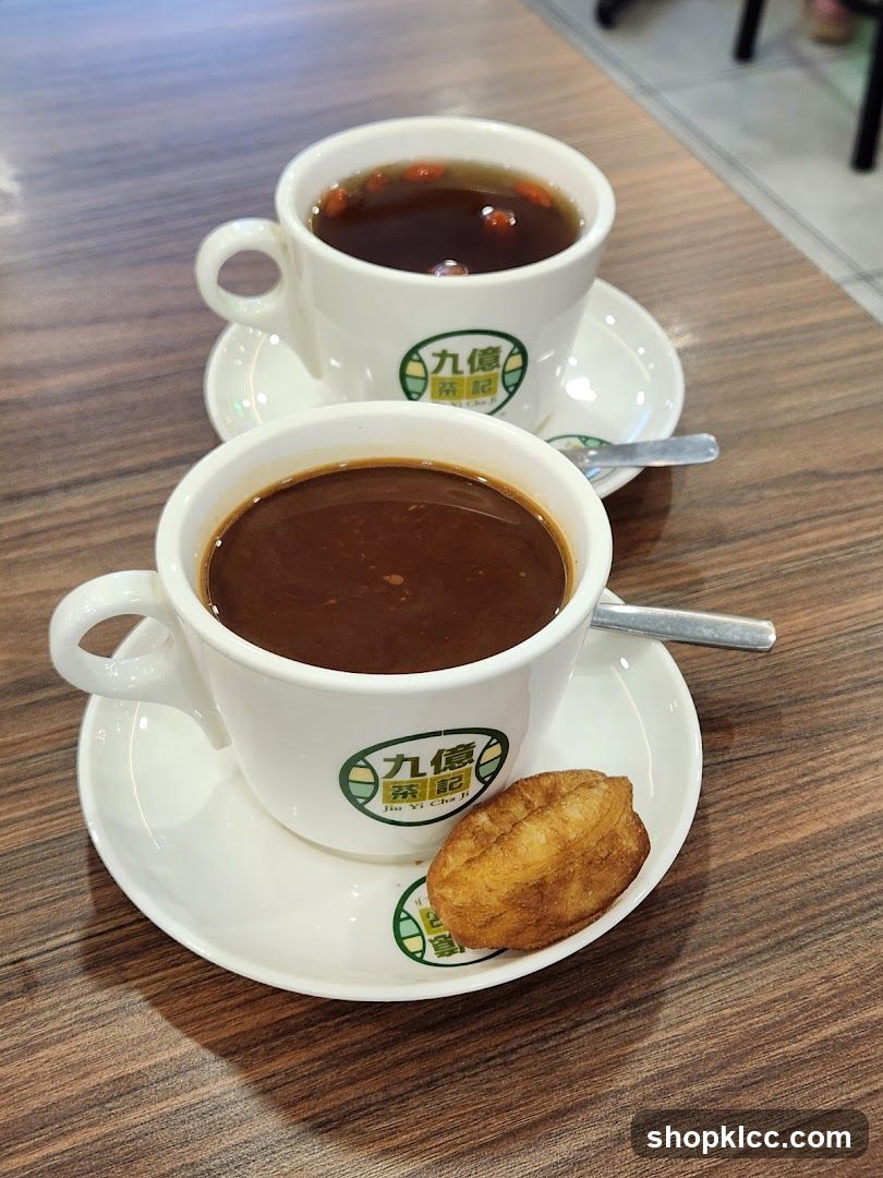 Cup of coffee and soup with pastry