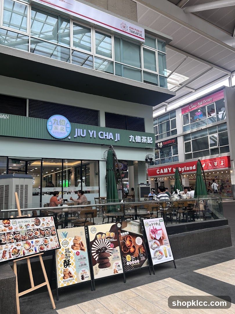 Jiu Yi Cha Ji Storefront with Menu Boards