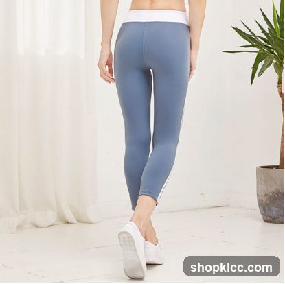 Woman in blue leggings walking away