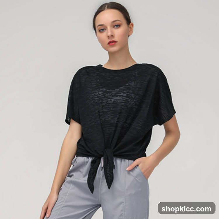 Fashion Model Wearing Black Knotted T-Shirt and Grey Pants