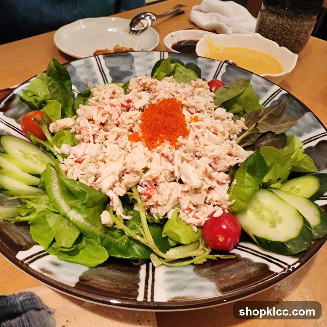 Salad with Crab Salad and Cucumber Slices