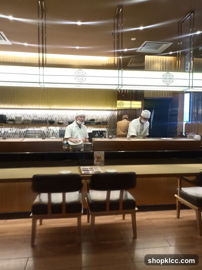 Restaurant Interior with Chefs at Counter