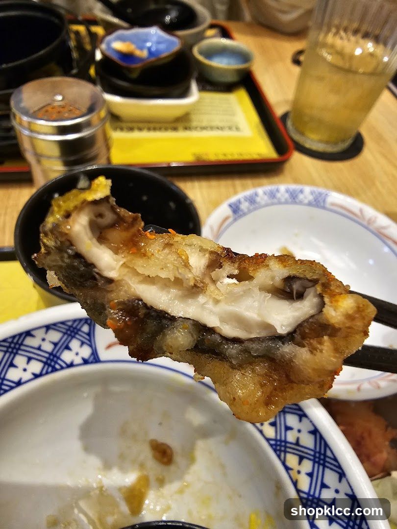 Fried Fish with Chopsticks