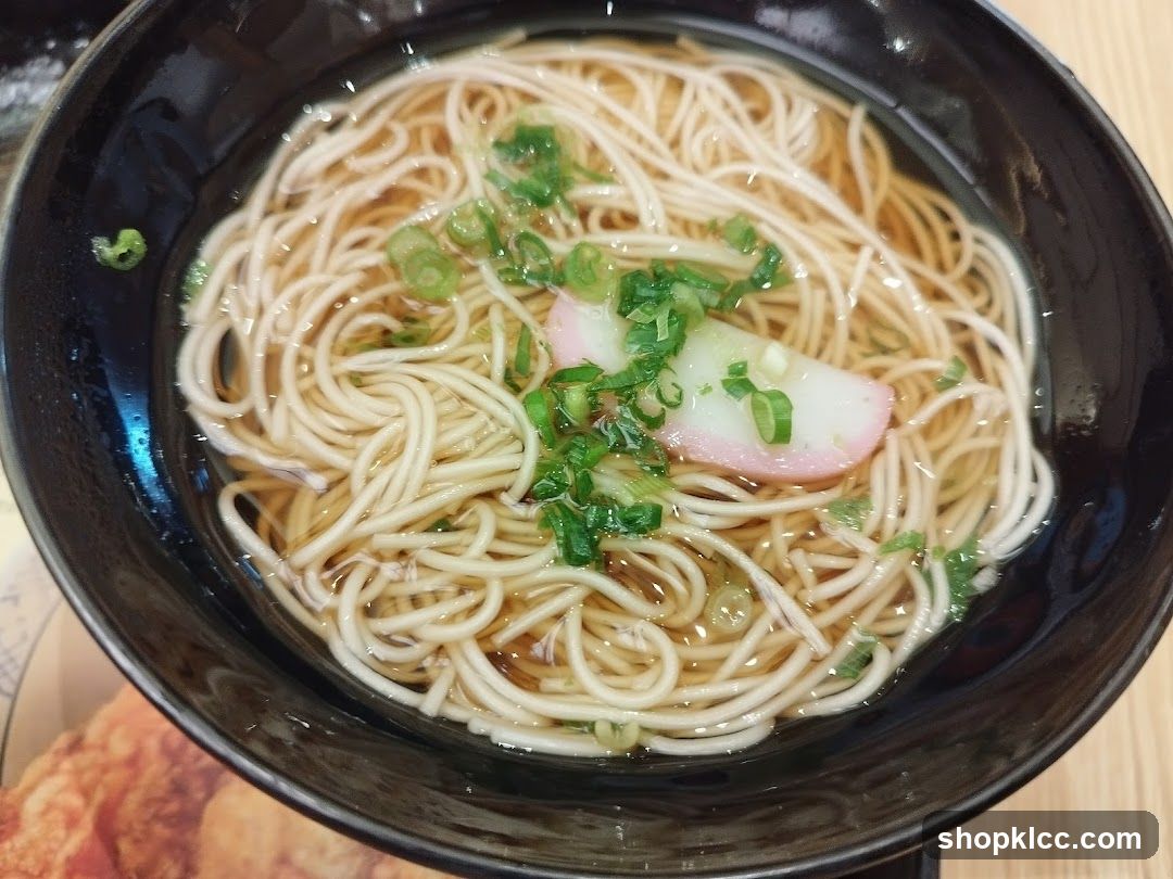 Bowl of Noodles with Green Onions and Fish Cake