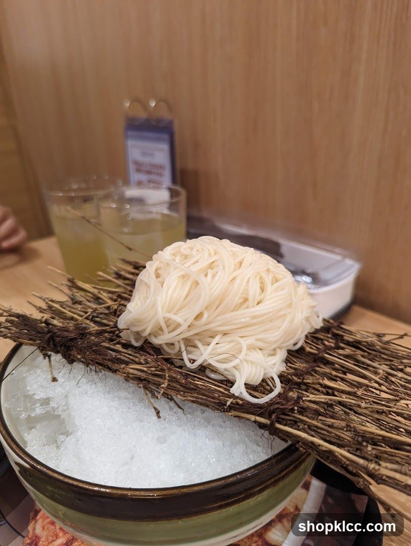 Noodle Dish with Ice and Straw