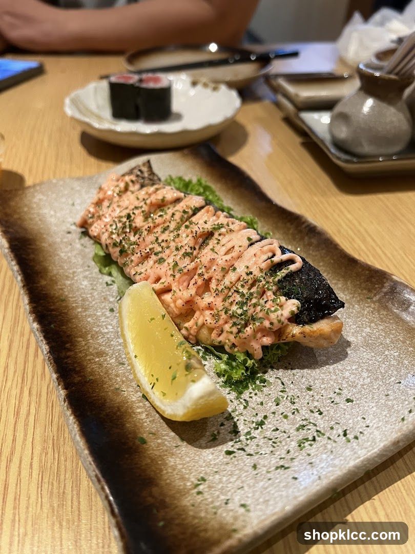 Grilled Fish with Sauce and Lemon