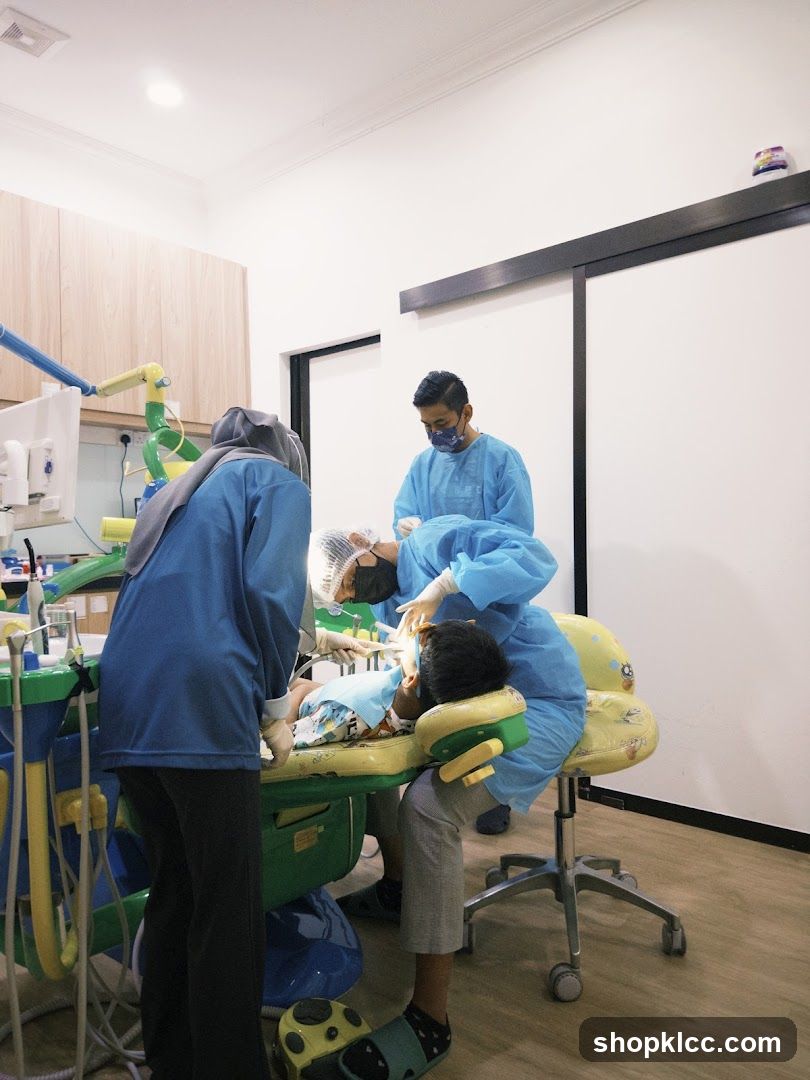 Dentist examining a child
