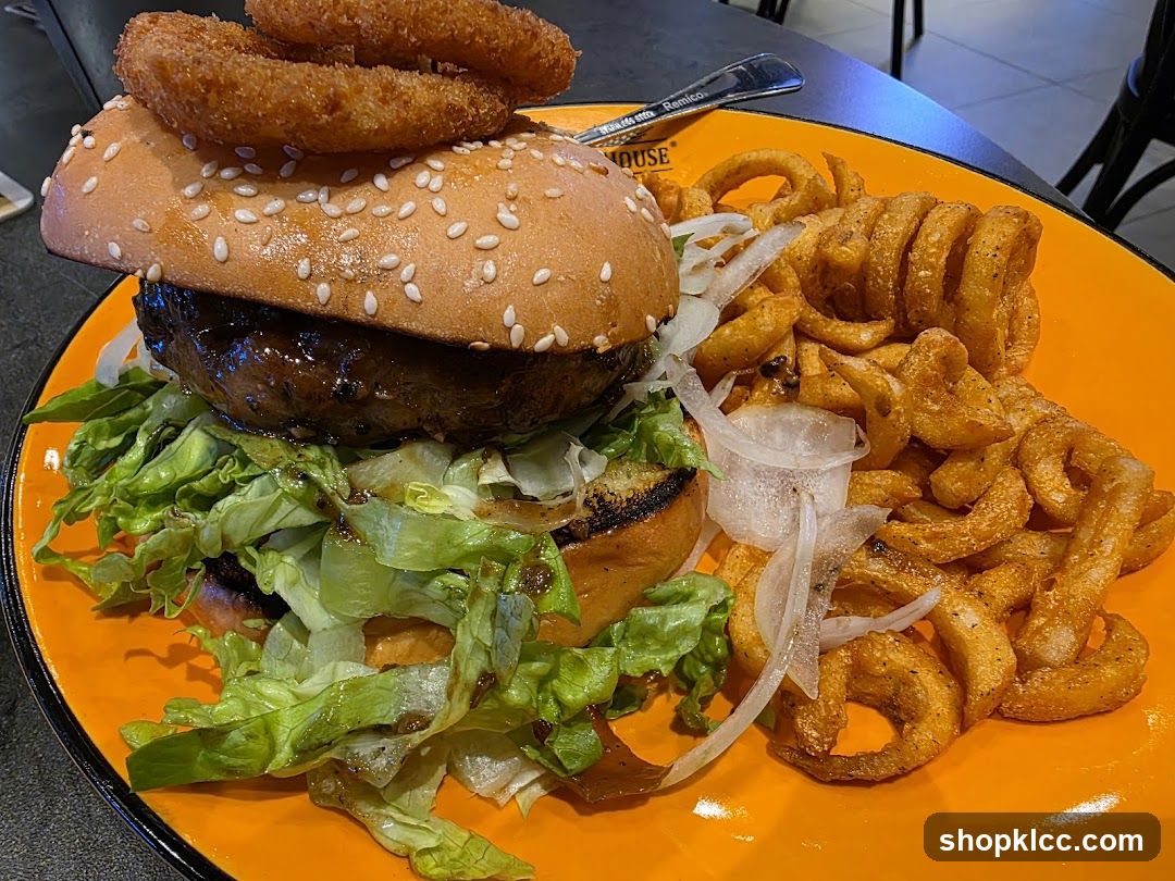 Burger with Onion Rings and Curly Fries