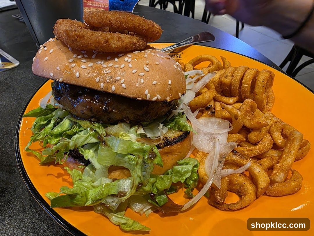 Burger with Onion Rings and Curly Fries
