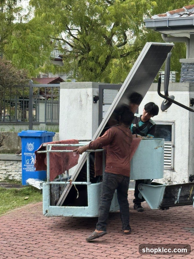 Workers Handling Equipment