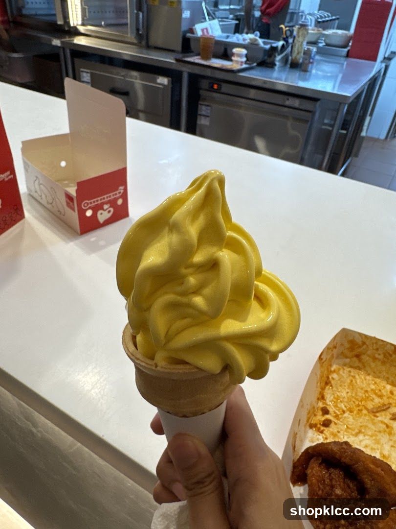 Yellow Soft Serve Ice Cream Cone