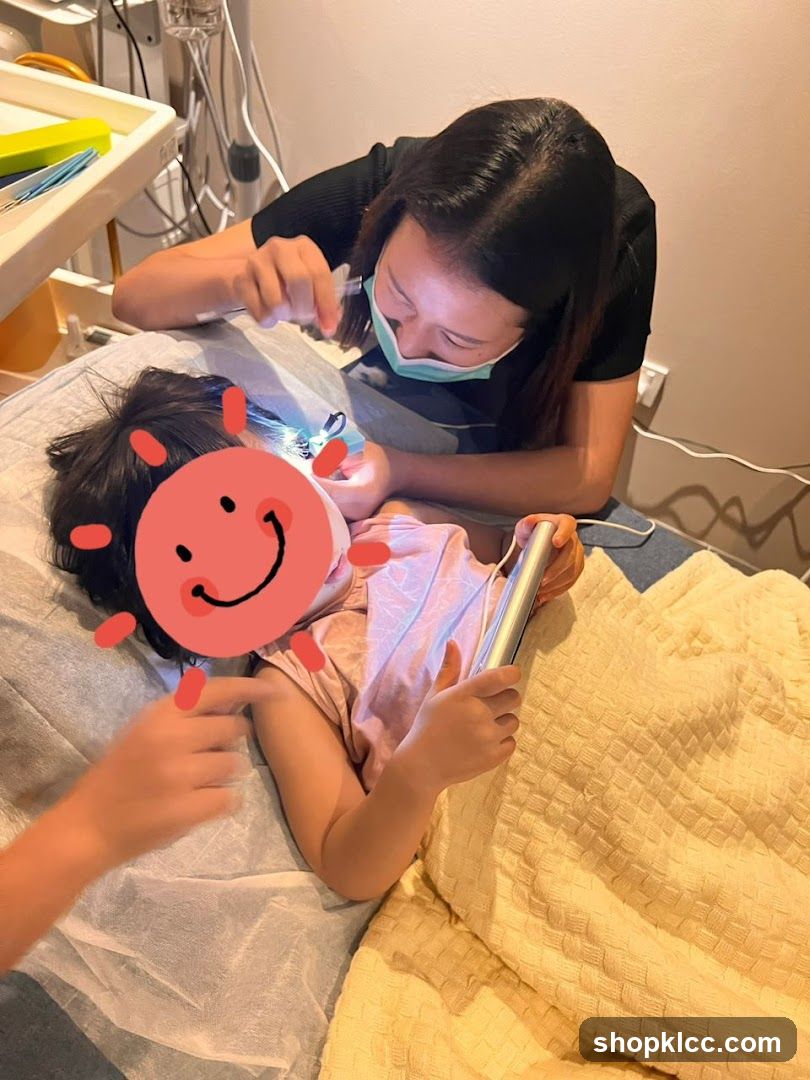 Child Dental Visit with Tablet Entertainment