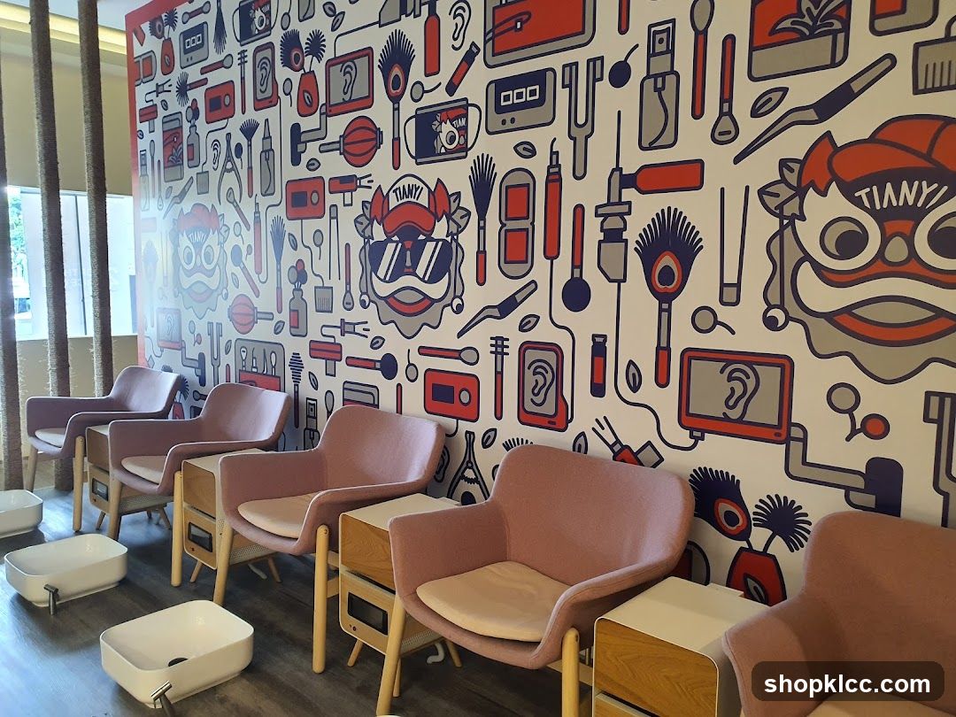 Interior of a salon or spa with colorful wall art and pink chairs