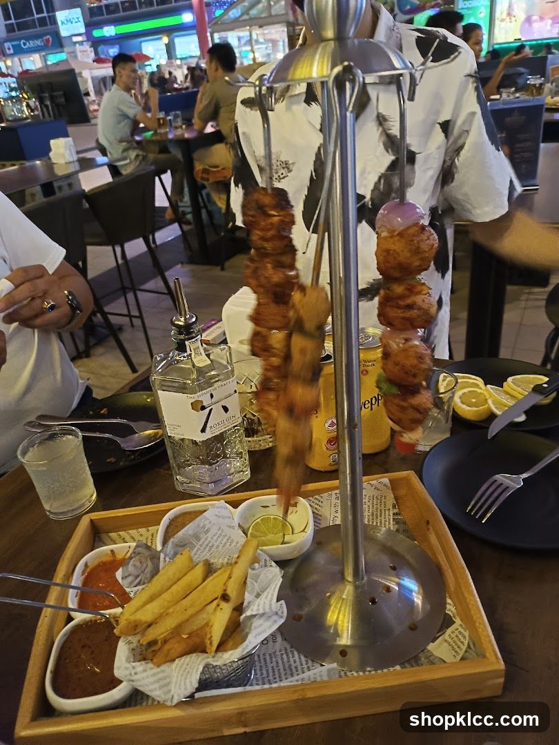 Grilled Skewers and Fries at a Night Market Bar