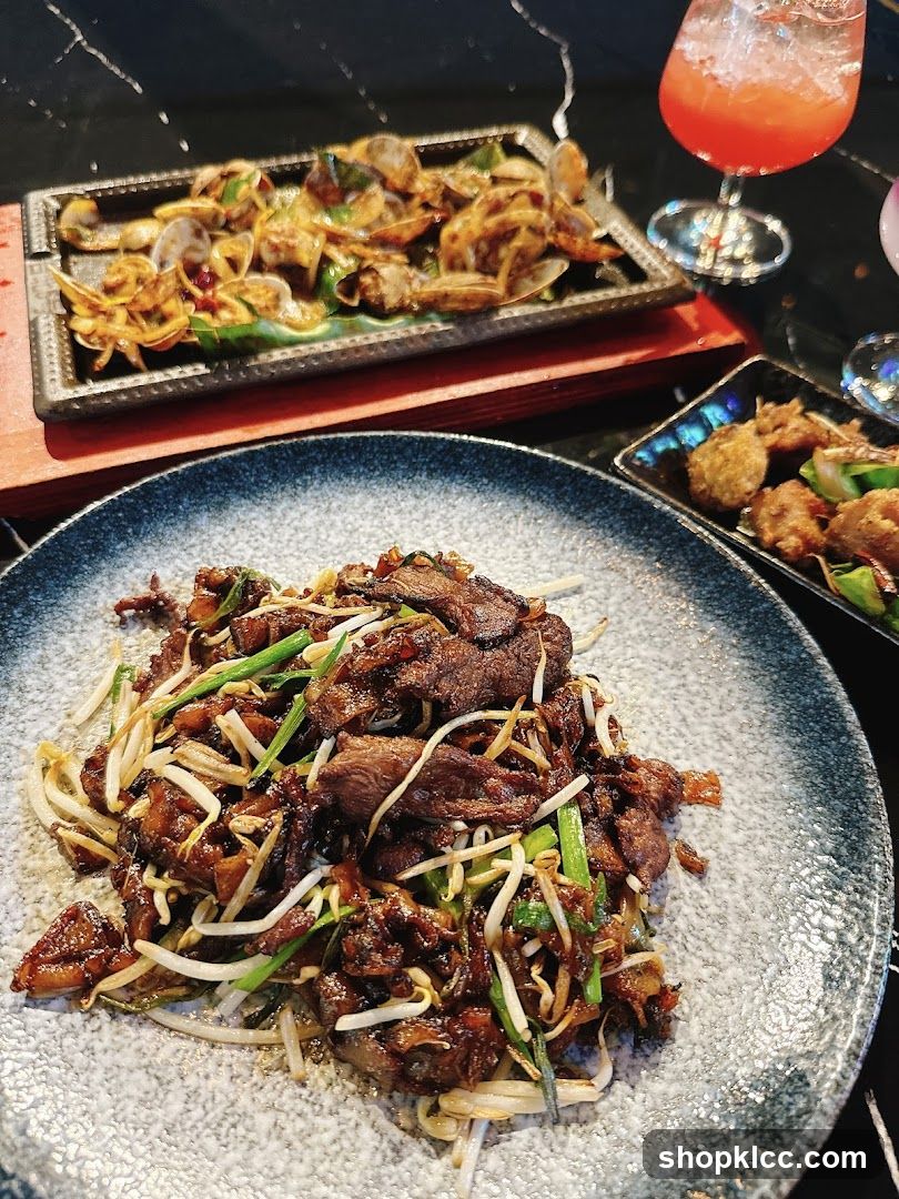 Food Spread with Stir-fried Meat and Clams