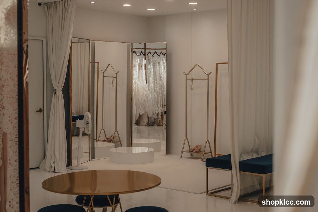 Boutique Interior with White Dresses and Mirrors